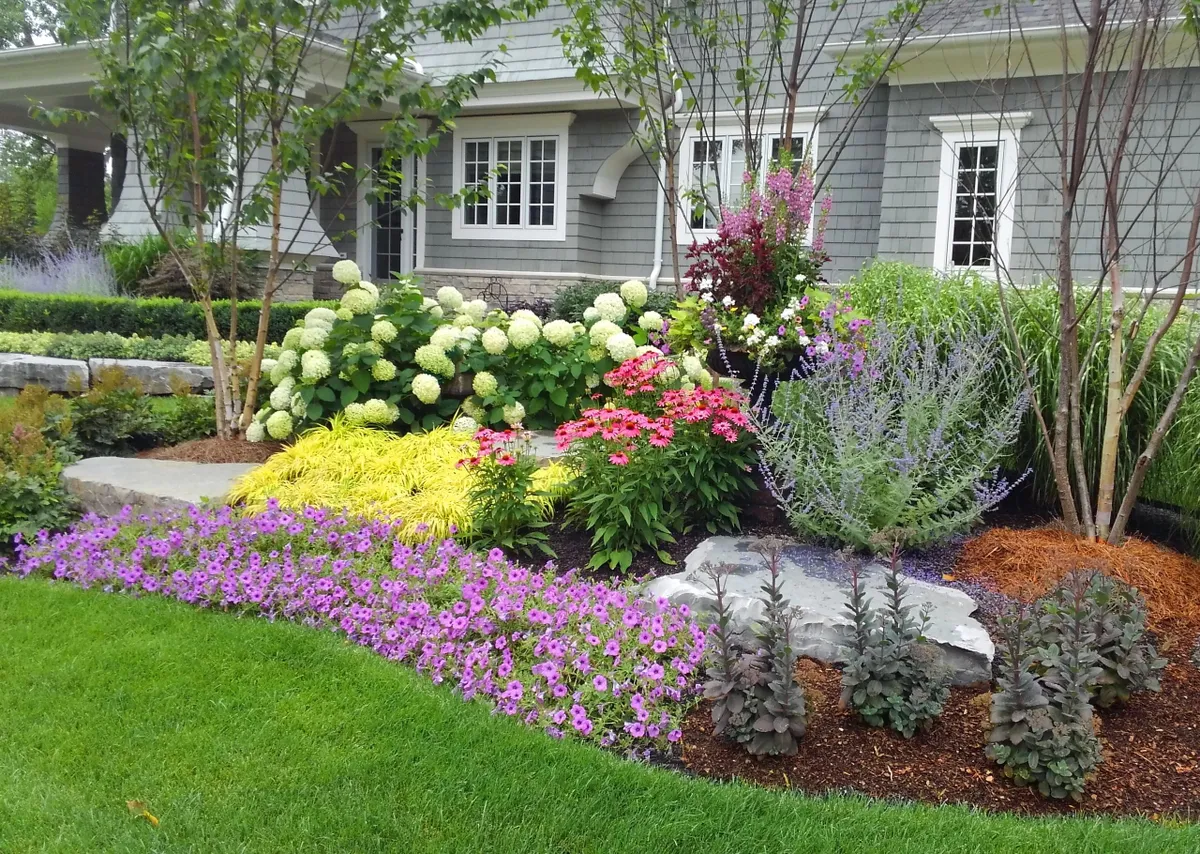 Plant Bed With Colorful Plants And Mulch Plant Bed With Colorful Plants And Mulch